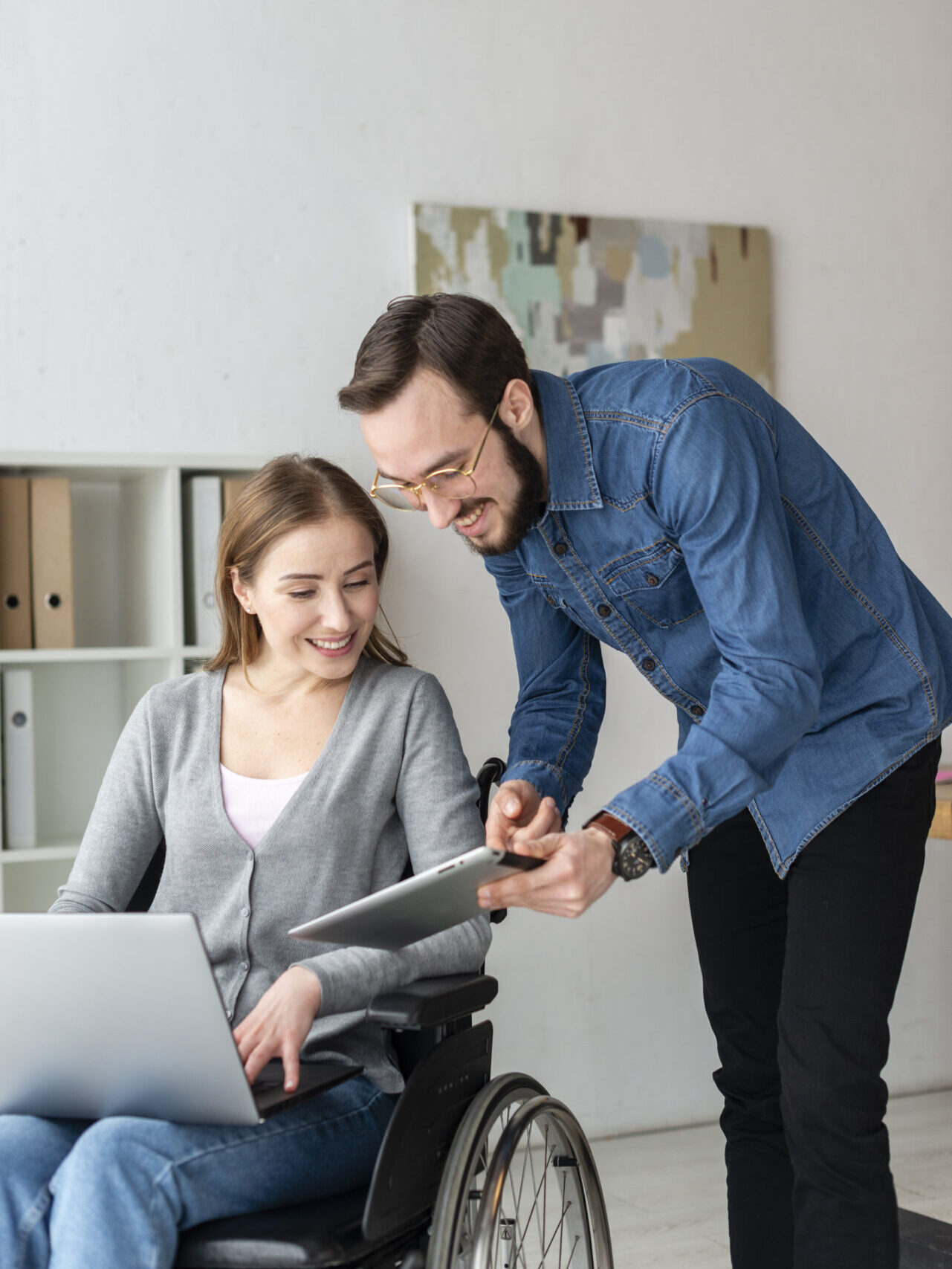 adult-man-woman-working-together-office